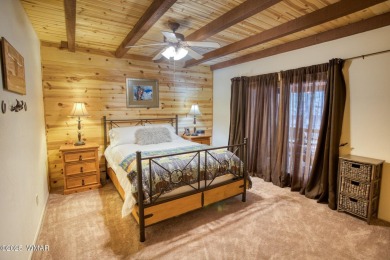 Located in Pinetop Country Club. Multi-level Chalet style home on Pinetop Lakes Country Club in Arizona - for sale on GolfHomes.com, golf home, golf lot