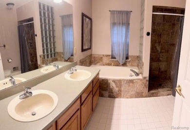 WELCOME TO THIS GREAT CAPE COD CONDO IN THE LINKS OF PHEASANT on Pheasant Run Golf Club in Michigan - for sale on GolfHomes.com, golf home, golf lot