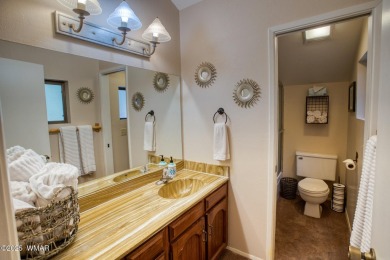 Located in Pinetop Country Club. Multi-level Chalet style home on Pinetop Lakes Country Club in Arizona - for sale on GolfHomes.com, golf home, golf lot