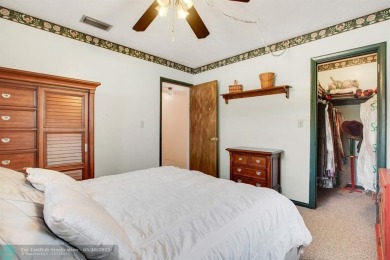 A rare offering in one of South Florida's most cherished on Cooper Colony Country Club in Florida - for sale on GolfHomes.com, golf home, golf lot