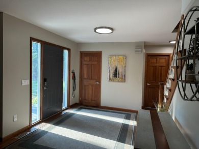 Beautiful golf course home on 2.4 acres overlooking the 6th on Michaywe Pines Course in Michigan - for sale on GolfHomes.com, golf home, golf lot