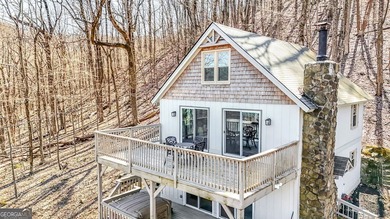 This updated 4-bedroom, 3-bath home is tucked into the Bent Tree on Bent Tree Golf Course in Georgia - for sale on GolfHomes.com, golf home, golf lot
