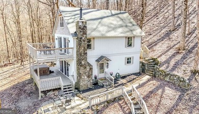 This updated 4-bedroom, 3-bath home is tucked into the Bent Tree on Bent Tree Golf Course in Georgia - for sale on GolfHomes.com, golf home, golf lot