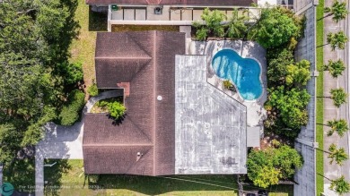 A rare offering in one of South Florida's most cherished on Cooper Colony Country Club in Florida - for sale on GolfHomes.com, golf home, golf lot