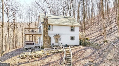 This updated 4-bedroom, 3-bath home is tucked into the Bent Tree on Bent Tree Golf Course in Georgia - for sale on GolfHomes.com, golf home, golf lot