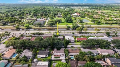 A rare offering in one of South Florida's most cherished on Cooper Colony Country Club in Florida - for sale on GolfHomes.com, golf home, golf lot