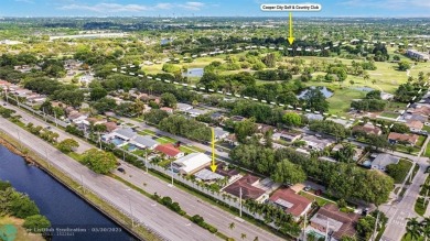 A rare offering in one of South Florida's most cherished on Cooper Colony Country Club in Florida - for sale on GolfHomes.com, golf home, golf lot