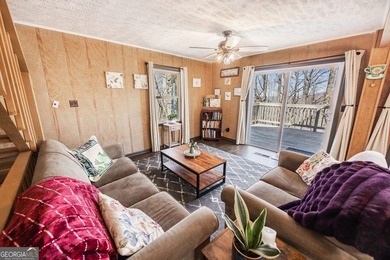 This updated 4-bedroom, 3-bath home is tucked into the Bent Tree on Bent Tree Golf Course in Georgia - for sale on GolfHomes.com, golf home, golf lot