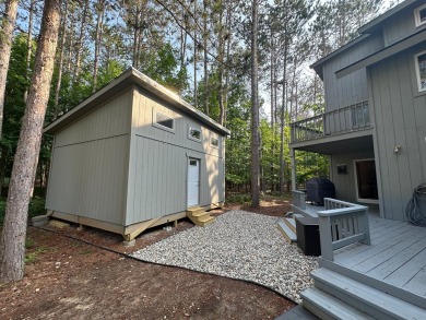 Beautiful golf course home on 2.4 acres overlooking the 6th on Michaywe Pines Course in Michigan - for sale on GolfHomes.com, golf home, golf lot
