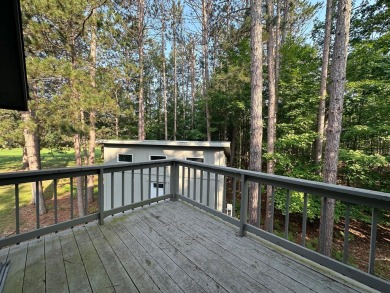 Beautiful golf course home on 2.4 acres overlooking the 6th on Michaywe Pines Course in Michigan - for sale on GolfHomes.com, golf home, golf lot
