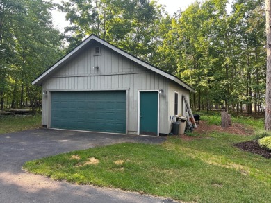 Beautiful golf course home on 2.4 acres overlooking the 6th on Michaywe Pines Course in Michigan - for sale on GolfHomes.com, golf home, golf lot