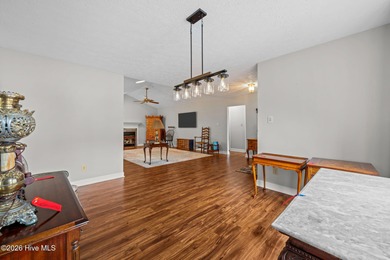 This well-maintained brick home sits on a spacious corner lot in on Harbour Point Golf Club in North Carolina - for sale on GolfHomes.com, golf home, golf lot