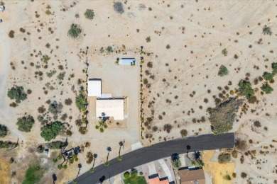 Title shows one bedroom, but this home is actually three on Lake Tamarisk Golf Course in California - for sale on GolfHomes.com, golf home, golf lot