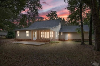 Step into this two-story home reminiscent of Southern Homes of a on Scenic Hills Country Club in Florida - for sale on GolfHomes.com, golf home, golf lot