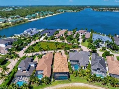 Open-concept waterfront single-family home in #1 Miromar Lakes on Miromar Lakes Golf Club in Florida - for sale on GolfHomes.com, golf home, golf lot