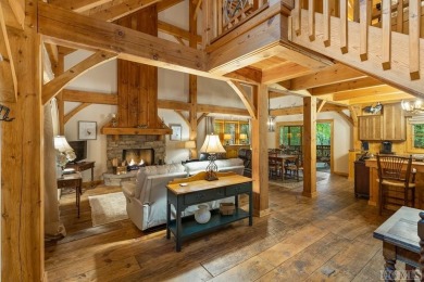 This beautiful, fully furnished, 3-bedroom, 2.5-bath wood cabin on Sapphire National Golf Club in North Carolina - for sale on GolfHomes.com, golf home, golf lot