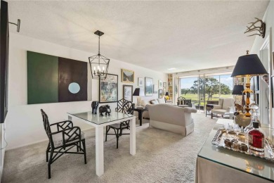 As you walk in, you're immediately struck by the breathtaking on Palm Aire Country Club of Sarasota in Florida - for sale on GolfHomes.com, golf home, golf lot