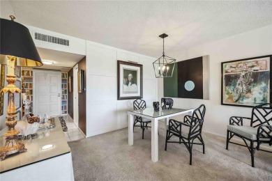 As you walk in, you're immediately struck by the breathtaking on Palm Aire Country Club of Sarasota in Florida - for sale on GolfHomes.com, golf home, golf lot