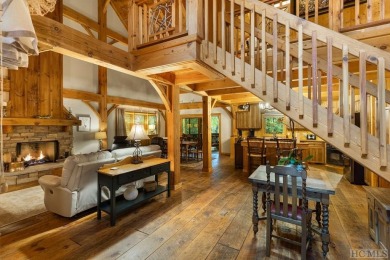 This beautiful, fully furnished, 3-bedroom, 2.5-bath wood cabin on Sapphire National Golf Club in North Carolina - for sale on GolfHomes.com, golf home, golf lot