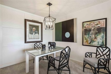 As you walk in, you're immediately struck by the breathtaking on Palm Aire Country Club of Sarasota in Florida - for sale on GolfHomes.com, golf home, golf lot