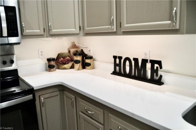 Recently featured on national TV, this beautifully updated home on Lake Louise Golf Club in North Carolina - for sale on GolfHomes.com, golf home, golf lot