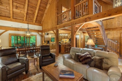 This beautiful, fully furnished, 3-bedroom, 2.5-bath wood cabin on Sapphire National Golf Club in North Carolina - for sale on GolfHomes.com, golf home, golf lot