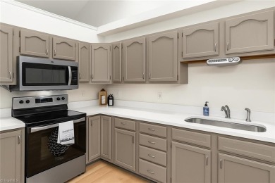 Recently featured on national TV, this beautifully updated home on Lake Louise Golf Club in North Carolina - for sale on GolfHomes.com, golf home, golf lot