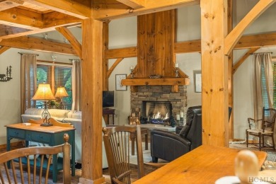 This beautiful, fully furnished, 3-bedroom, 2.5-bath wood cabin on Sapphire National Golf Club in North Carolina - for sale on GolfHomes.com, golf home, golf lot