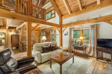 This beautiful, fully furnished, 3-bedroom, 2.5-bath wood cabin on Sapphire National Golf Club in North Carolina - for sale on GolfHomes.com, golf home, golf lot