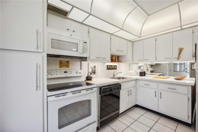 As you walk in, you're immediately struck by the breathtaking on Palm Aire Country Club of Sarasota in Florida - for sale on GolfHomes.com, golf home, golf lot