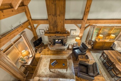 This beautiful, fully furnished, 3-bedroom, 2.5-bath wood cabin on Sapphire National Golf Club in North Carolina - for sale on GolfHomes.com, golf home, golf lot