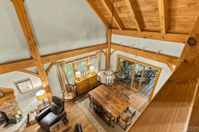 This beautiful, fully furnished, 3-bedroom, 2.5-bath wood cabin on Sapphire National Golf Club in North Carolina - for sale on GolfHomes.com, golf home, golf lot