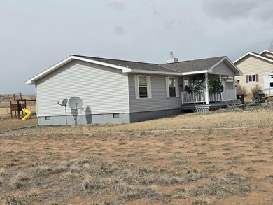 Check out this home in Dubois! This 3 bedroom, 2 bath home is on  in Wyoming - for sale on GolfHomes.com, golf home, golf lot