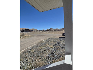 Check out this home in Dubois! This 3 bedroom, 2 bath home is on  in Wyoming - for sale on GolfHomes.com, golf home, golf lot