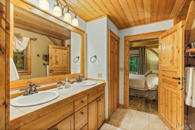 This beautiful, fully furnished, 3-bedroom, 2.5-bath wood cabin on Sapphire National Golf Club in North Carolina - for sale on GolfHomes.com, golf home, golf lot