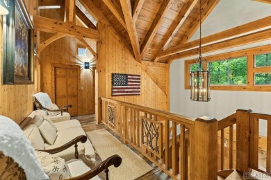 This beautiful, fully furnished, 3-bedroom, 2.5-bath wood cabin on Sapphire National Golf Club in North Carolina - for sale on GolfHomes.com, golf home, golf lot