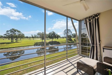 As you walk in, you're immediately struck by the breathtaking on Palm Aire Country Club of Sarasota in Florida - for sale on GolfHomes.com, golf home, golf lot
