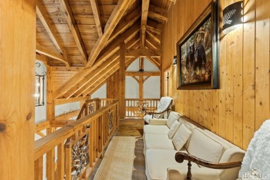 This beautiful, fully furnished, 3-bedroom, 2.5-bath wood cabin on Sapphire National Golf Club in North Carolina - for sale on GolfHomes.com, golf home, golf lot