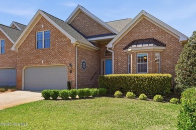 Bright & cheery end unit townhome with low maintenance brick on Cape Fear National At Brunswick Forest in North Carolina - for sale on GolfHomes.com, golf home, golf lot