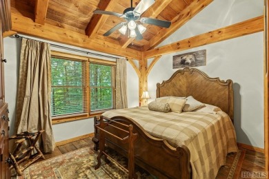 This beautiful, fully furnished, 3-bedroom, 2.5-bath wood cabin on Sapphire National Golf Club in North Carolina - for sale on GolfHomes.com, golf home, golf lot