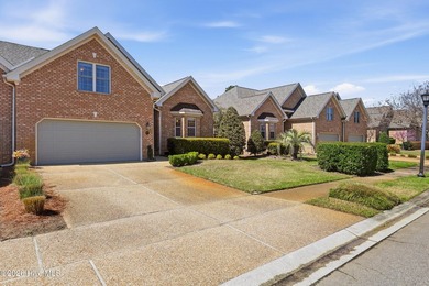 Bright & cheery end unit townhome with low maintenance brick on Cape Fear National At Brunswick Forest in North Carolina - for sale on GolfHomes.com, golf home, golf lot