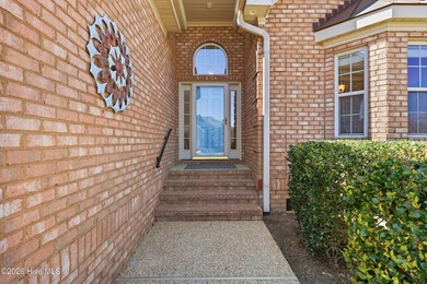 Bright & cheery end unit townhome with low maintenance brick on Cape Fear National At Brunswick Forest in North Carolina - for sale on GolfHomes.com, golf home, golf lot