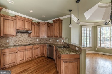 Located in The Fairways, this beautifully maintained 5-bedroom on Stonebridge Golf Club in Georgia - for sale on GolfHomes.com, golf home, golf lot