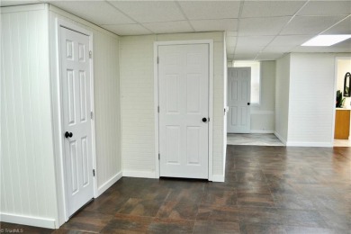 Recently featured on national TV, this beautifully updated home on Lake Louise Golf Club in North Carolina - for sale on GolfHomes.com, golf home, golf lot