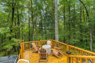 This beautiful, fully furnished, 3-bedroom, 2.5-bath wood cabin on Sapphire National Golf Club in North Carolina - for sale on GolfHomes.com, golf home, golf lot