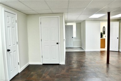 Recently featured on national TV, this beautifully updated home on Lake Louise Golf Club in North Carolina - for sale on GolfHomes.com, golf home, golf lot