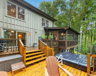 This beautiful, fully furnished, 3-bedroom, 2.5-bath wood cabin on Sapphire National Golf Club in North Carolina - for sale on GolfHomes.com, golf home, golf lot