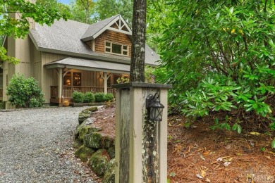 This beautiful, fully furnished, 3-bedroom, 2.5-bath wood cabin on Sapphire National Golf Club in North Carolina - for sale on GolfHomes.com, golf home, golf lot