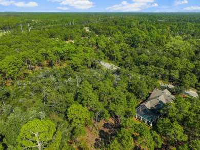 This .55-acre vacant lot is located in the gated Wild Heron on Sharks Tooth Golf Club in Florida - for sale on GolfHomes.com, golf home, golf lot