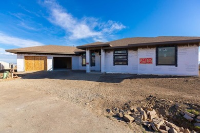Experience luxury in this newly constructed Redlands masterpiece on The Golf Club At Redlands Mesa in Colorado - for sale on GolfHomes.com, golf home, golf lot